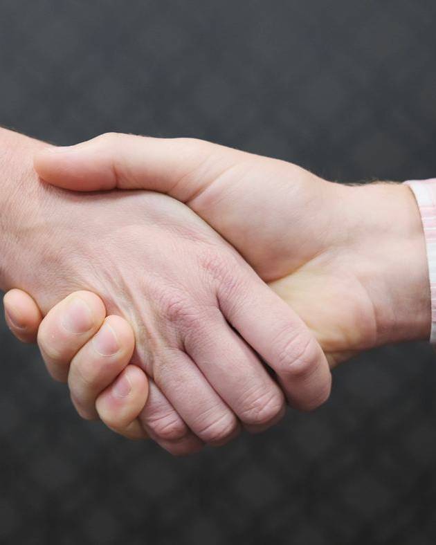 Two people shaking hands