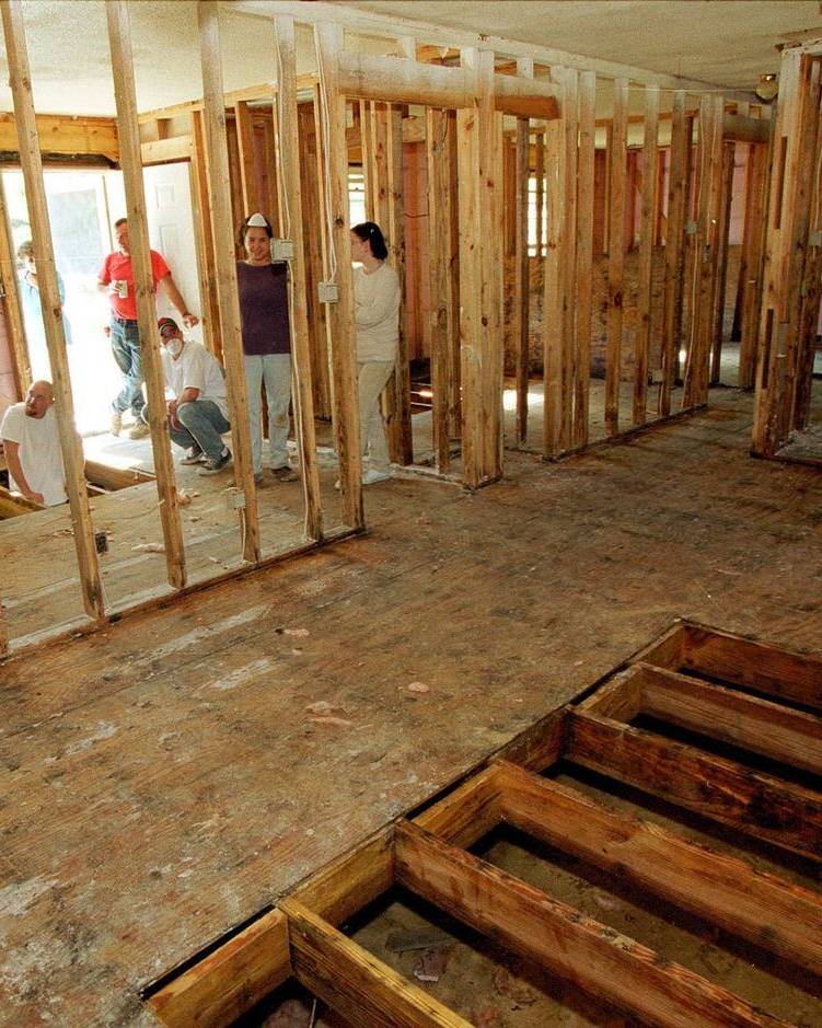Volunteers clearing out a flooded house in Princeville, North Carolina